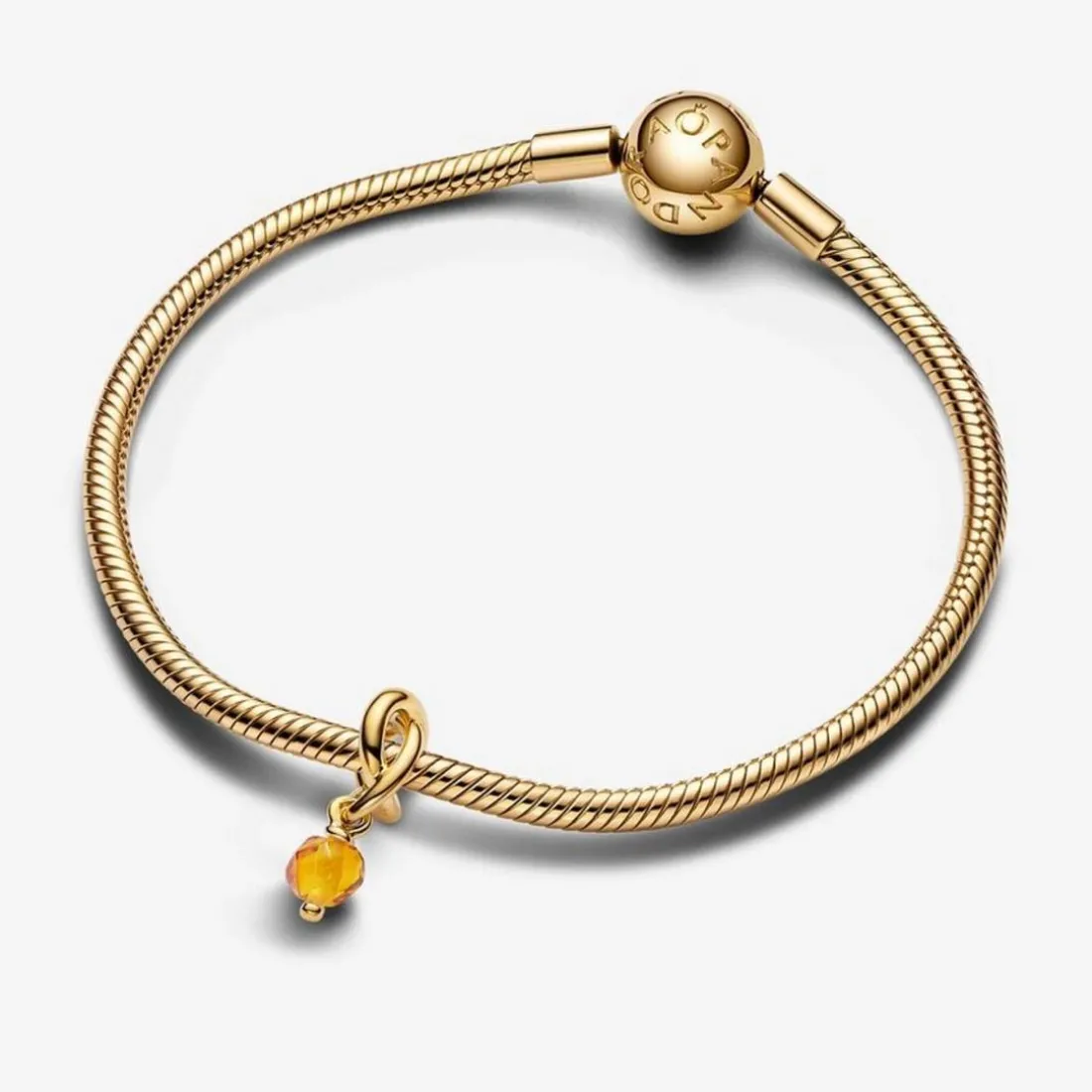 Charm Pendant doré avec cristal de couleur miel